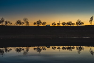 calm water during daytime latvia zoom background