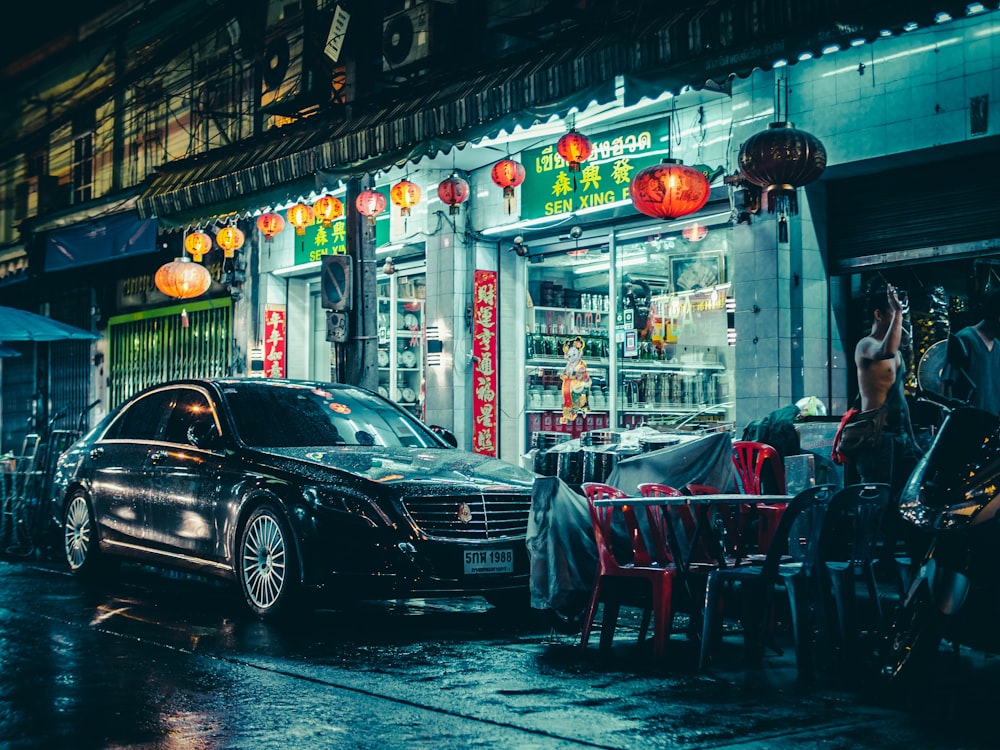 vehicle parked beside store