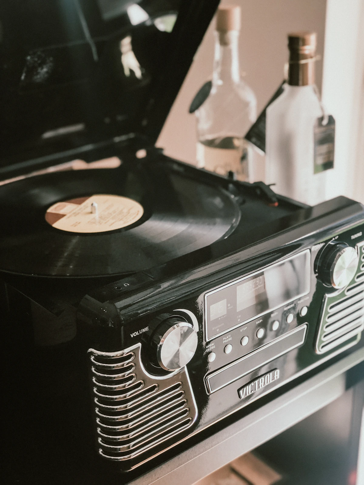 Black vinyl record playing on a record player