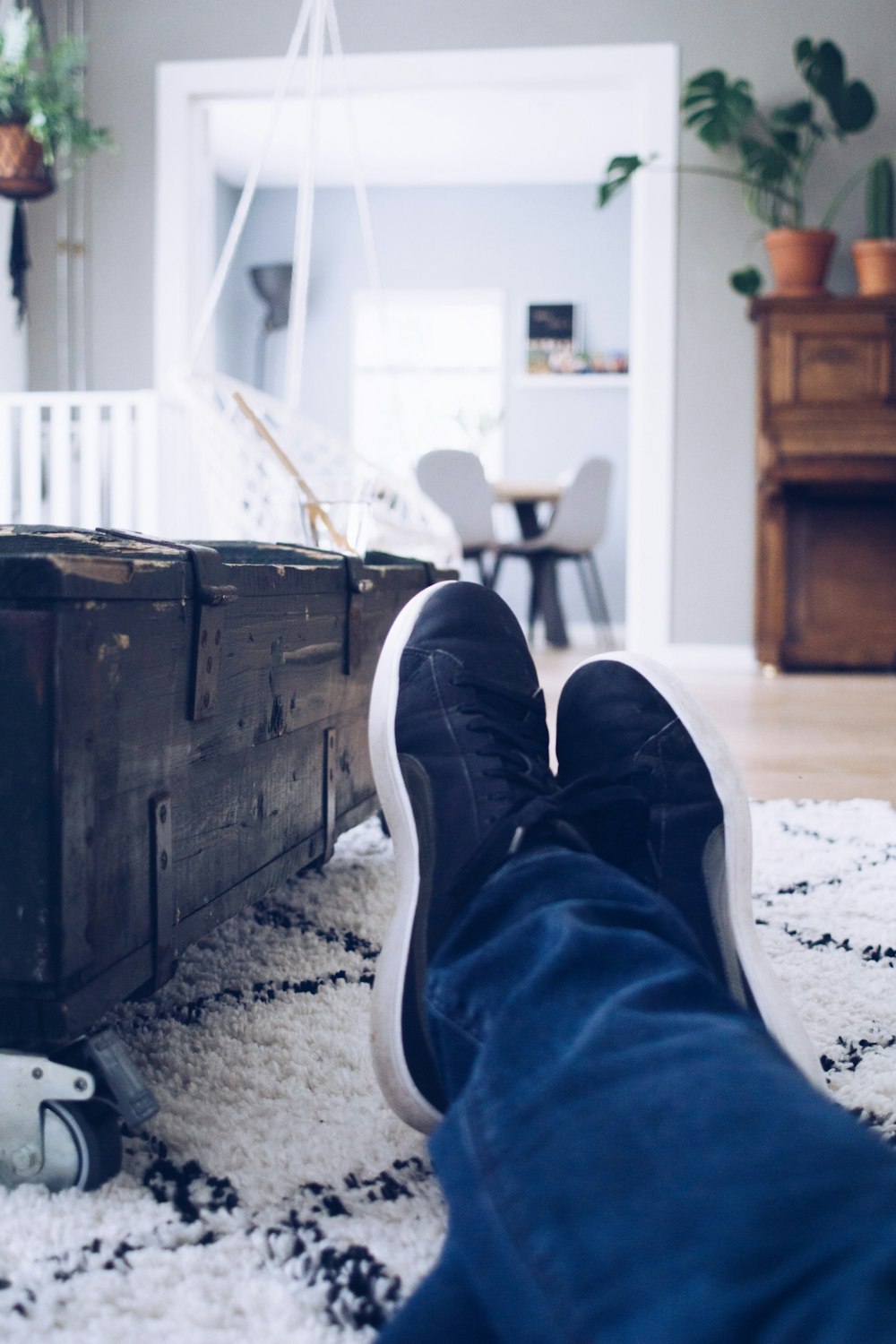 pair of black low-top sneakers