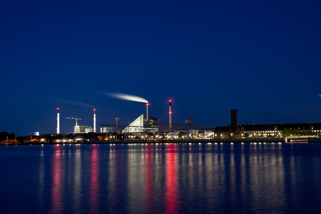 buildings near body of water during nighttime