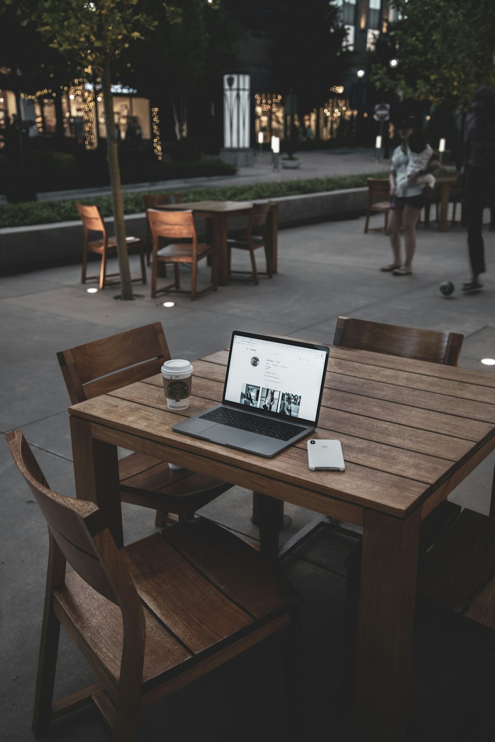 turned-on laptop on table