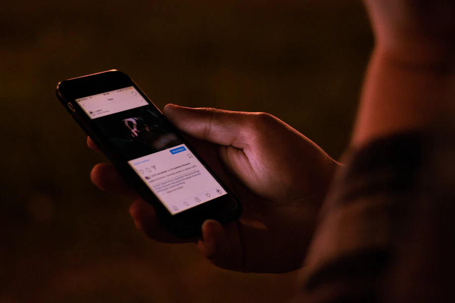 Person holding a smartphone in a casual setting