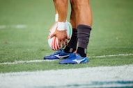 man holding rugby ball