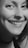 Image of a happy client smiling after receiving services.
