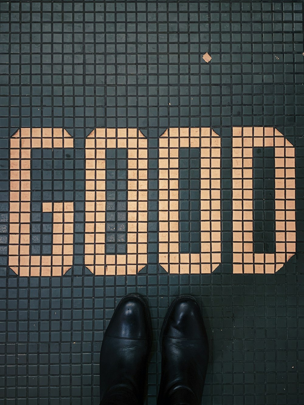 person standing in front of good printed pavement