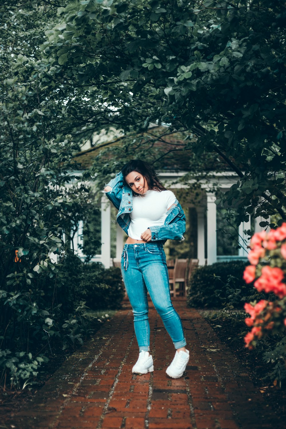 woman wearing blue denim jacket