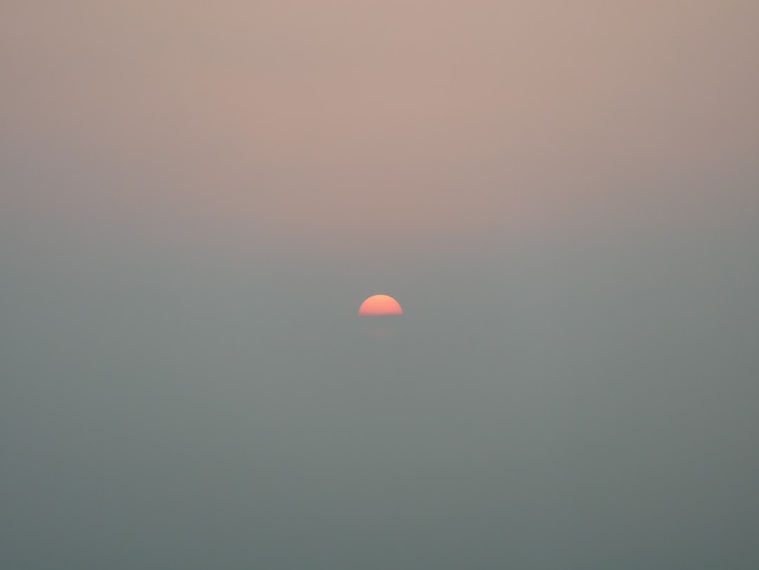 sunset through fogs
