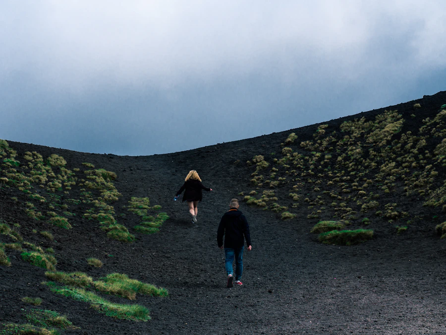 Travellers hiking together through mountain scenery