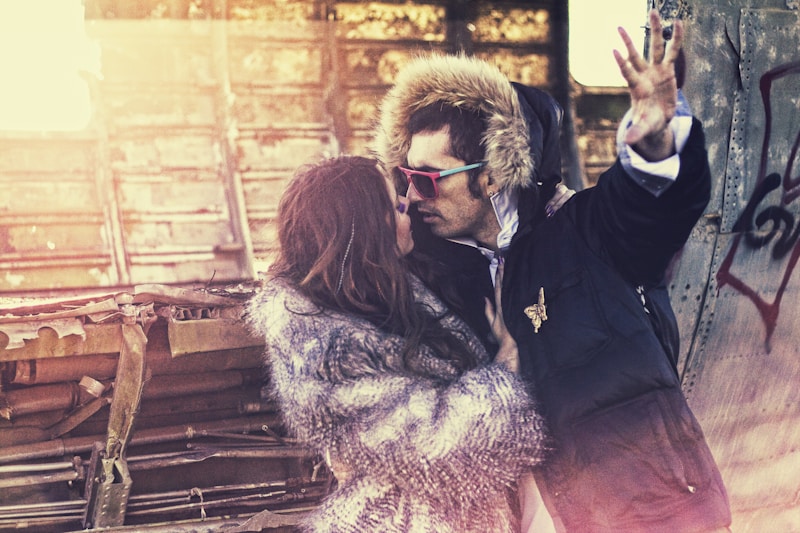 Romantic embrace in stylish coats