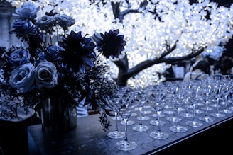 An elegant arrangement of metal martini tables in a modern setting.