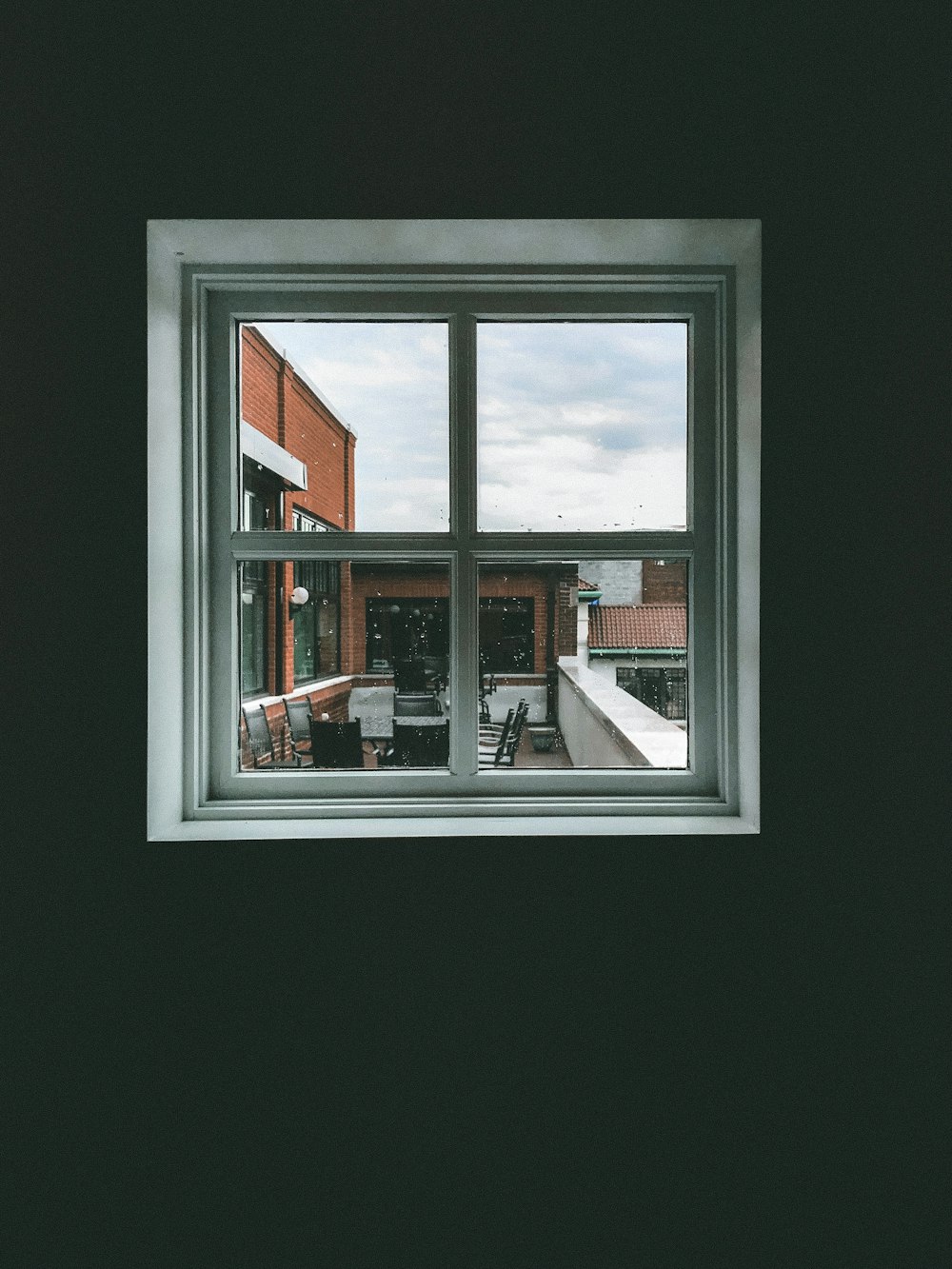 closed white wooden framed glass window