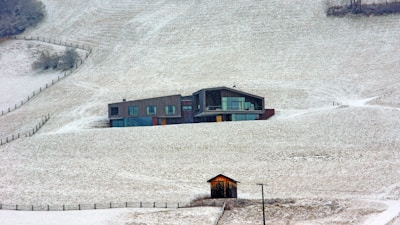 Expandable container home set against a snowy Canadian landscape.