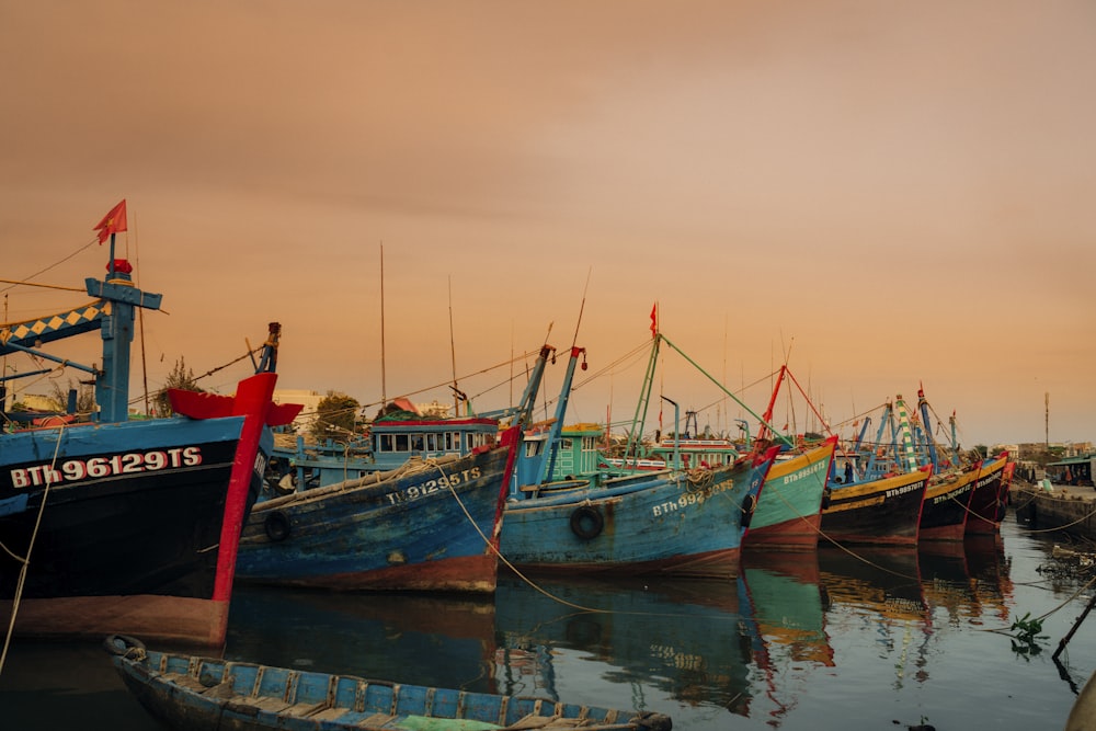 assorted-color boat in body of water during daytime