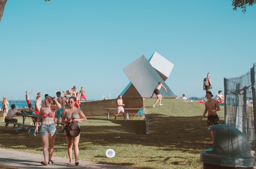 people near ocean during daytime