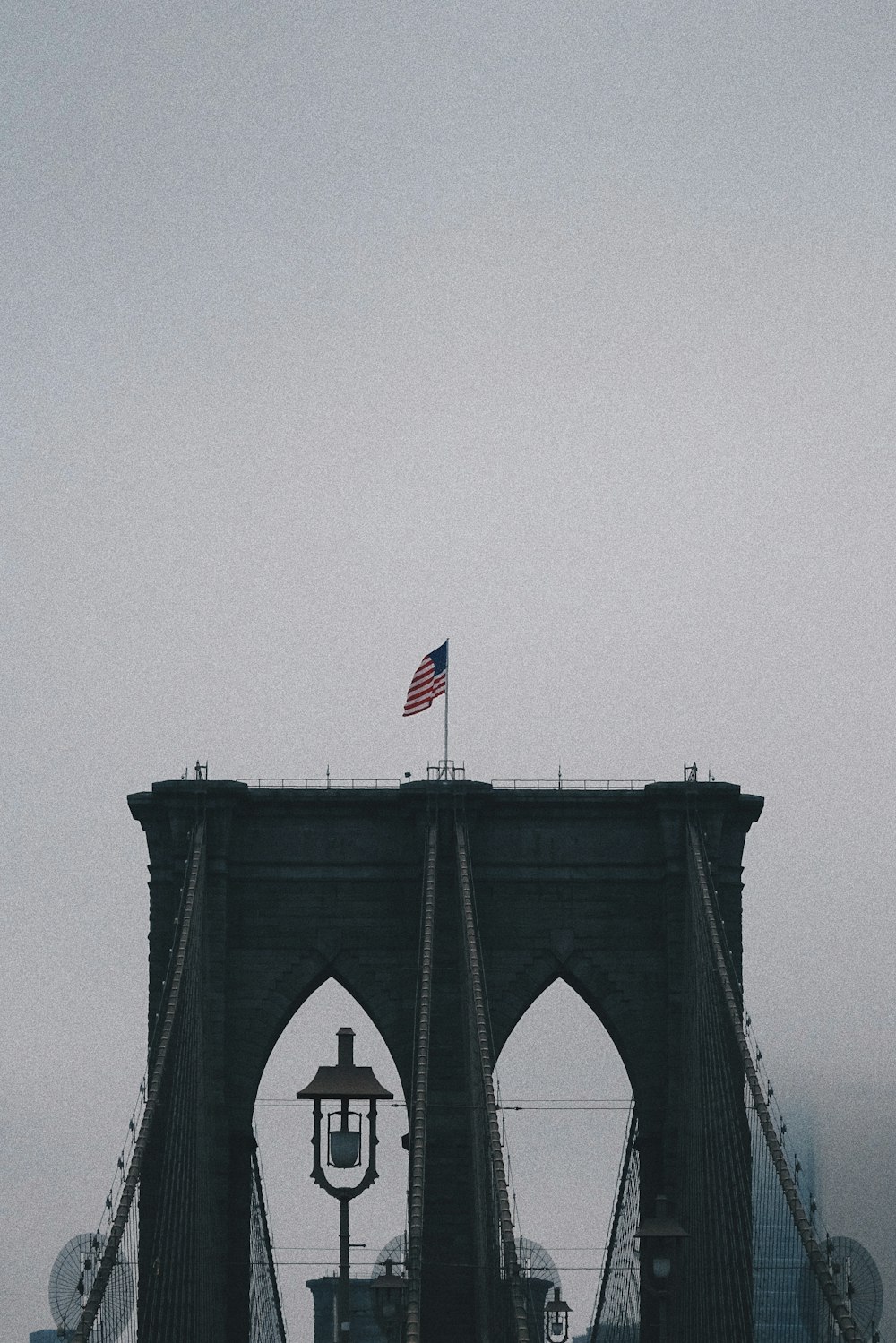 flag of America on concrete bridge