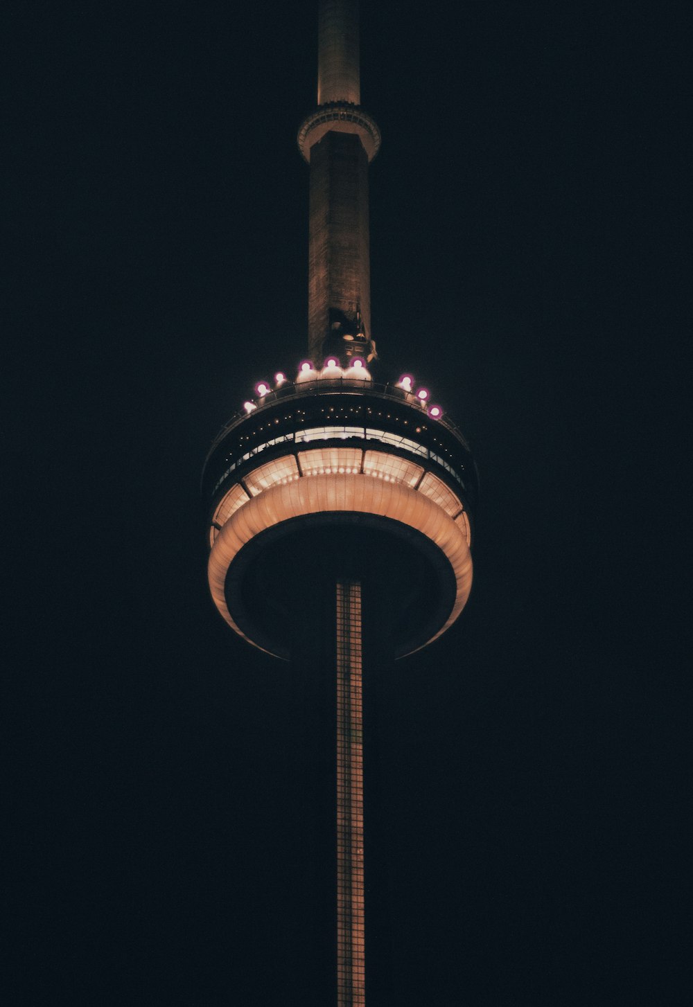 low angle photo of lighted tower