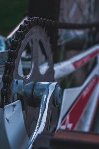 Detailed shot of a motorcycle transmission system with gears and chain.
