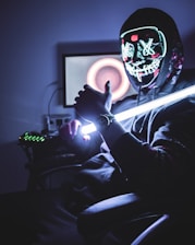 person holding light saber