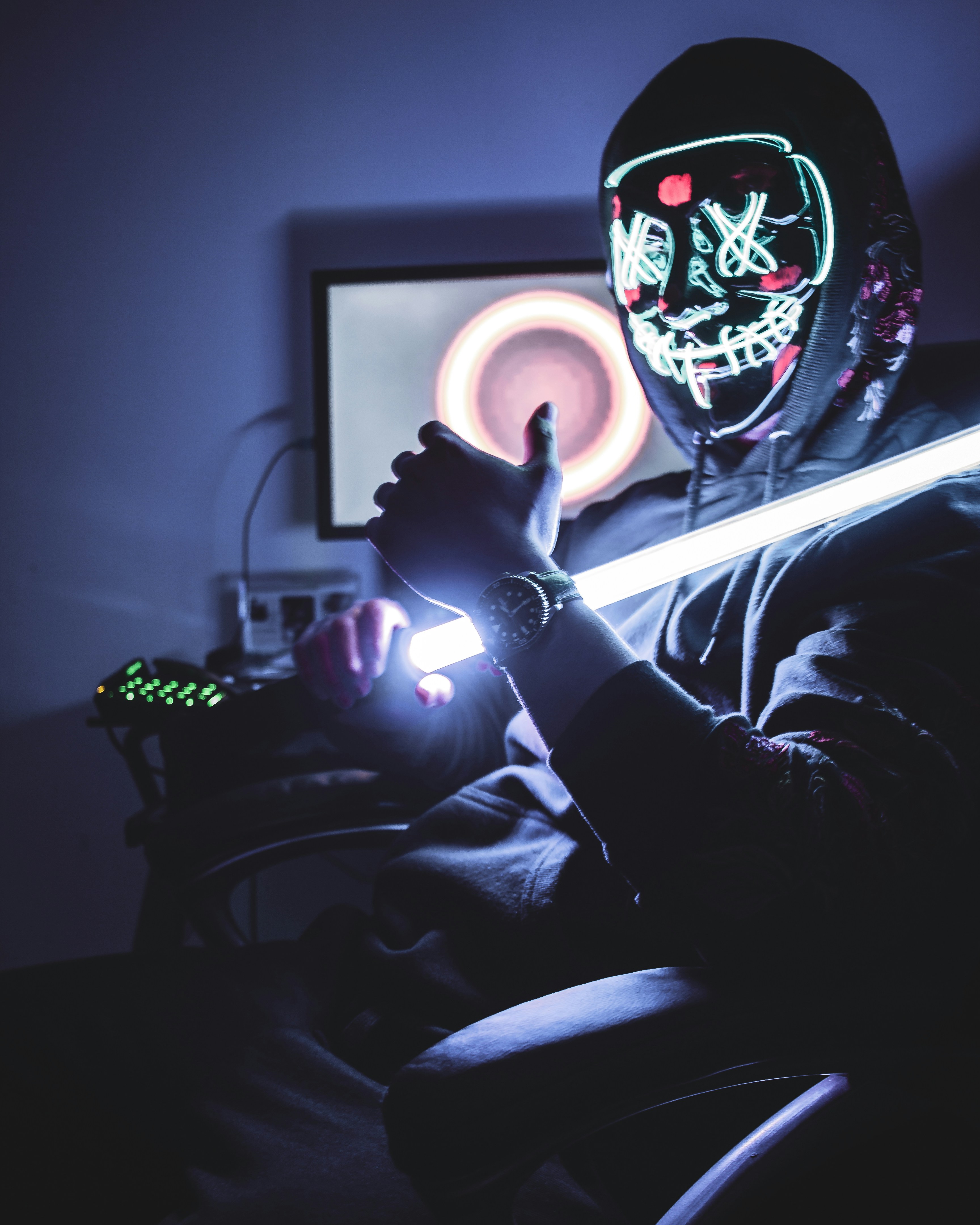 person holding light saber