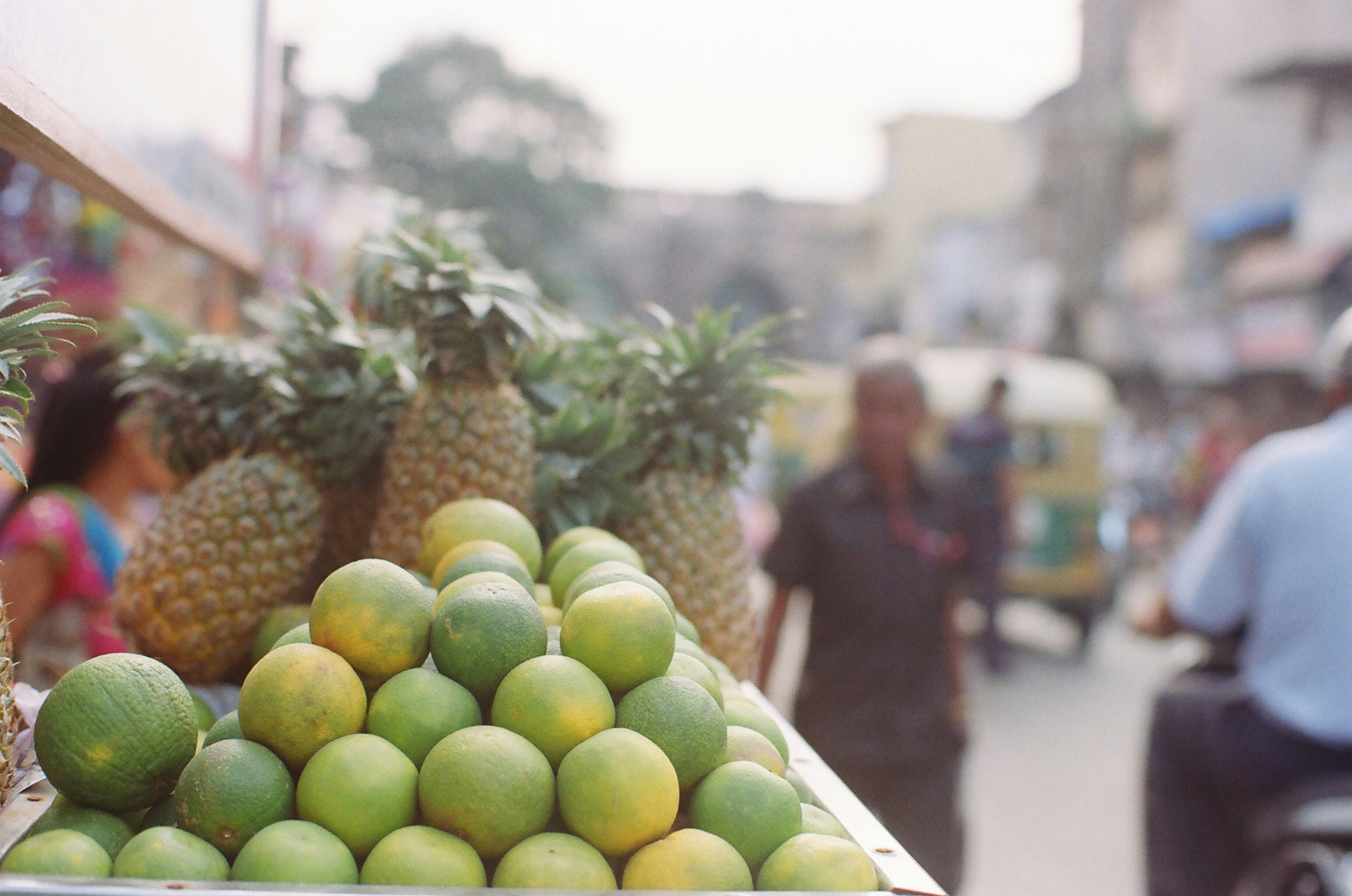 green pineapples and sunkist fruits, 