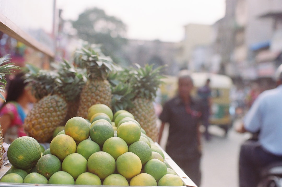 green pineapples and sunkist fruits,