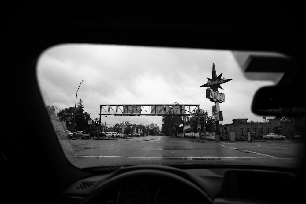 grayscale photo of road sign