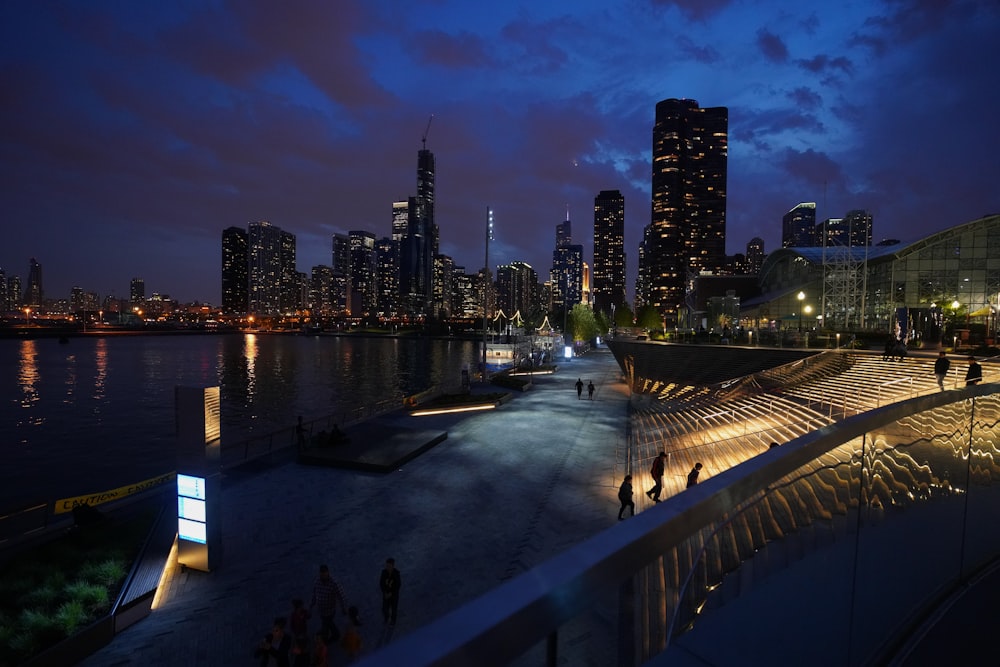 buildings across body of water at night