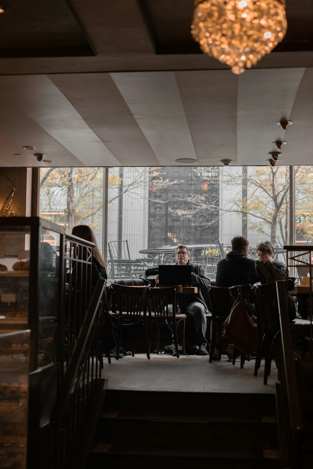 man sitting near the window