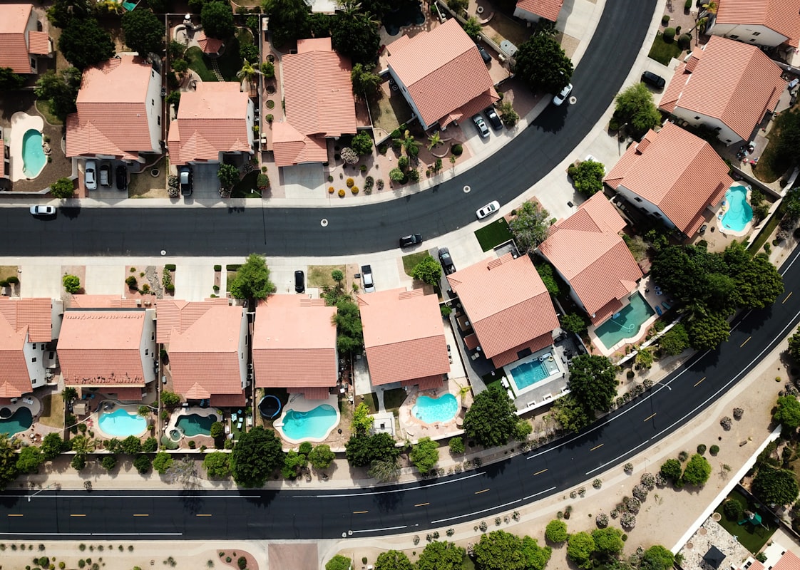 Aerial view of a residential neighborhood in the Tampa Bay area with pools