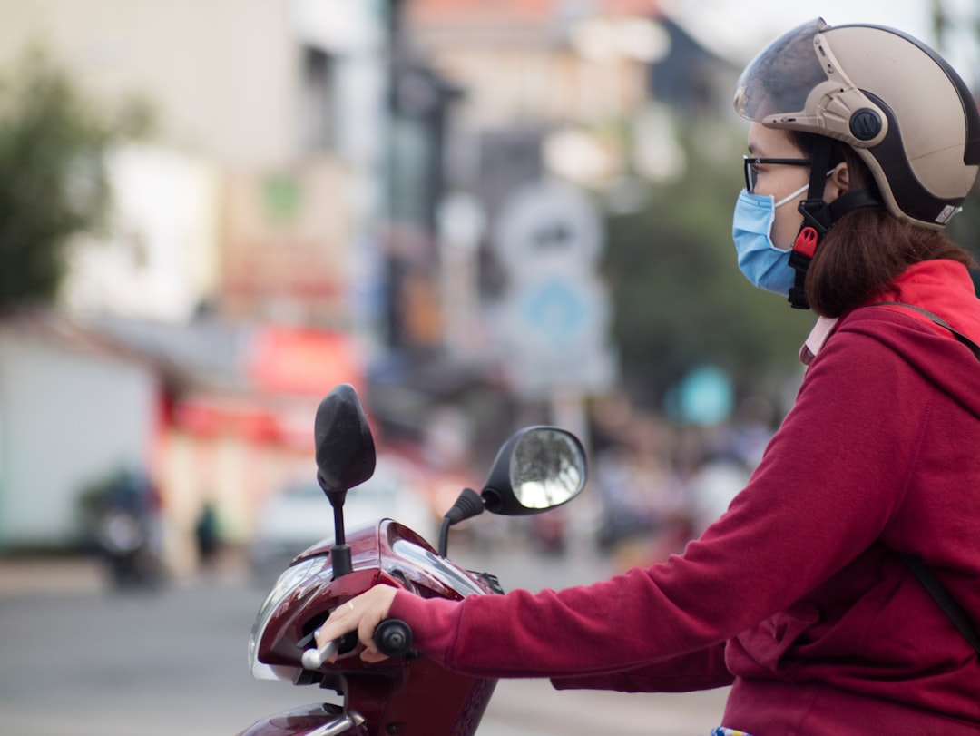 woman riding motorcycle