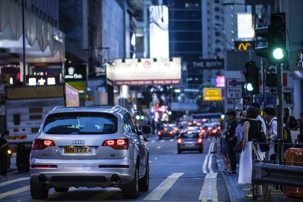 gray Audi vehicle on street