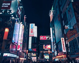 A vibrant street scene in Tokyo showcasing the latest smartphones and digital billboards glowing with AI-powered ads.
