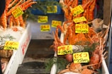 A stunning display of fresh live crabs on a market stall.