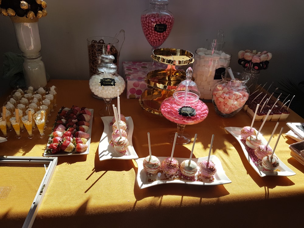 assorted desserts displayed on table