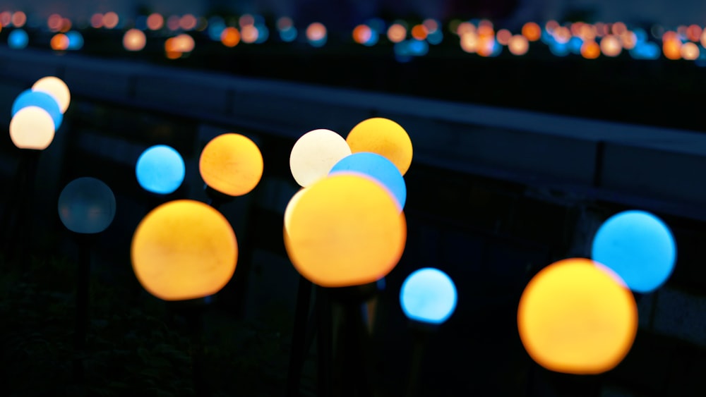 yellow, blue, and white bokeh lights
