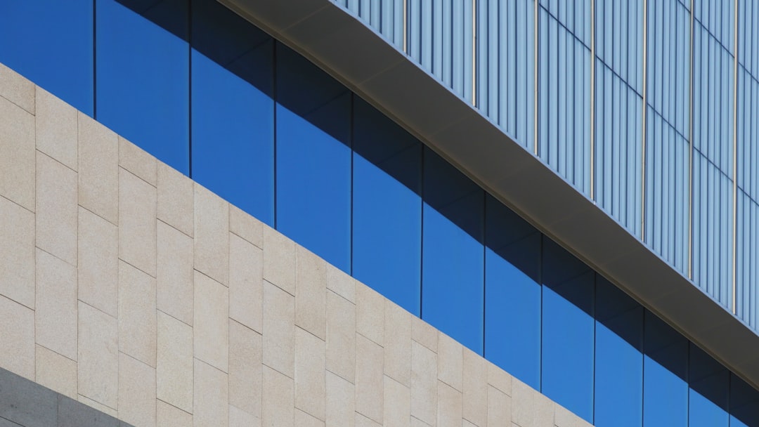 blue and beige glass walled building