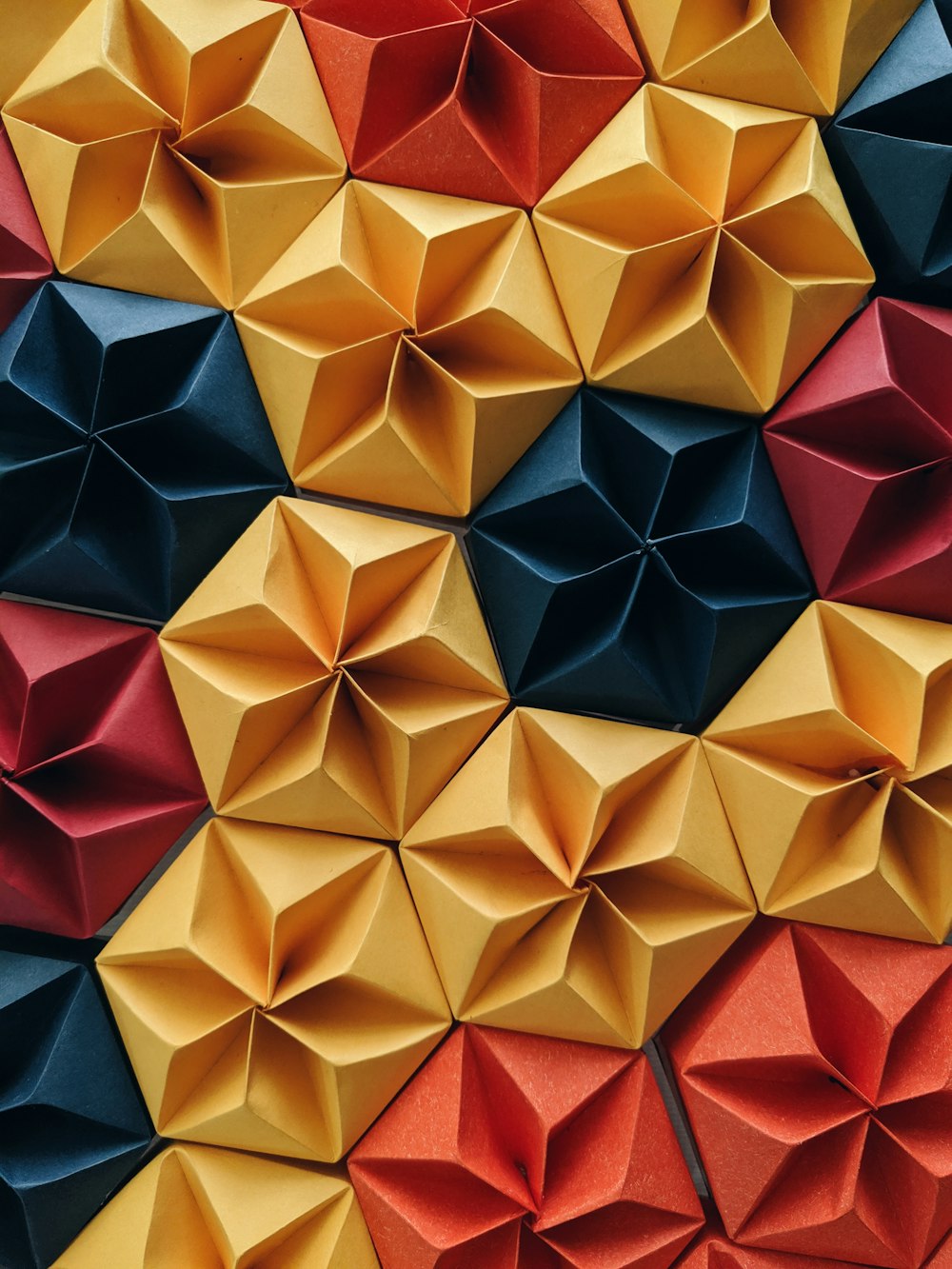 red, yellow, and blue flower origami