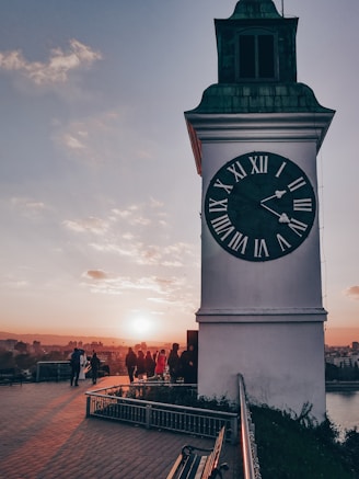 analog clock on building