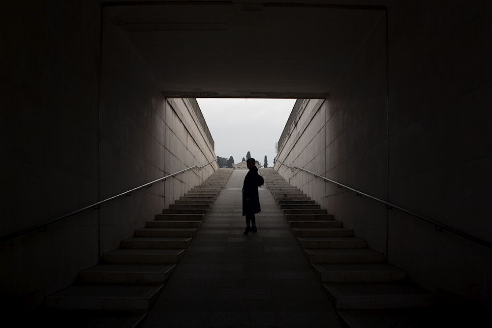 standing person on concrete stairs