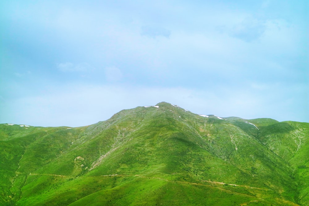 green mountain under blue sky during daytime