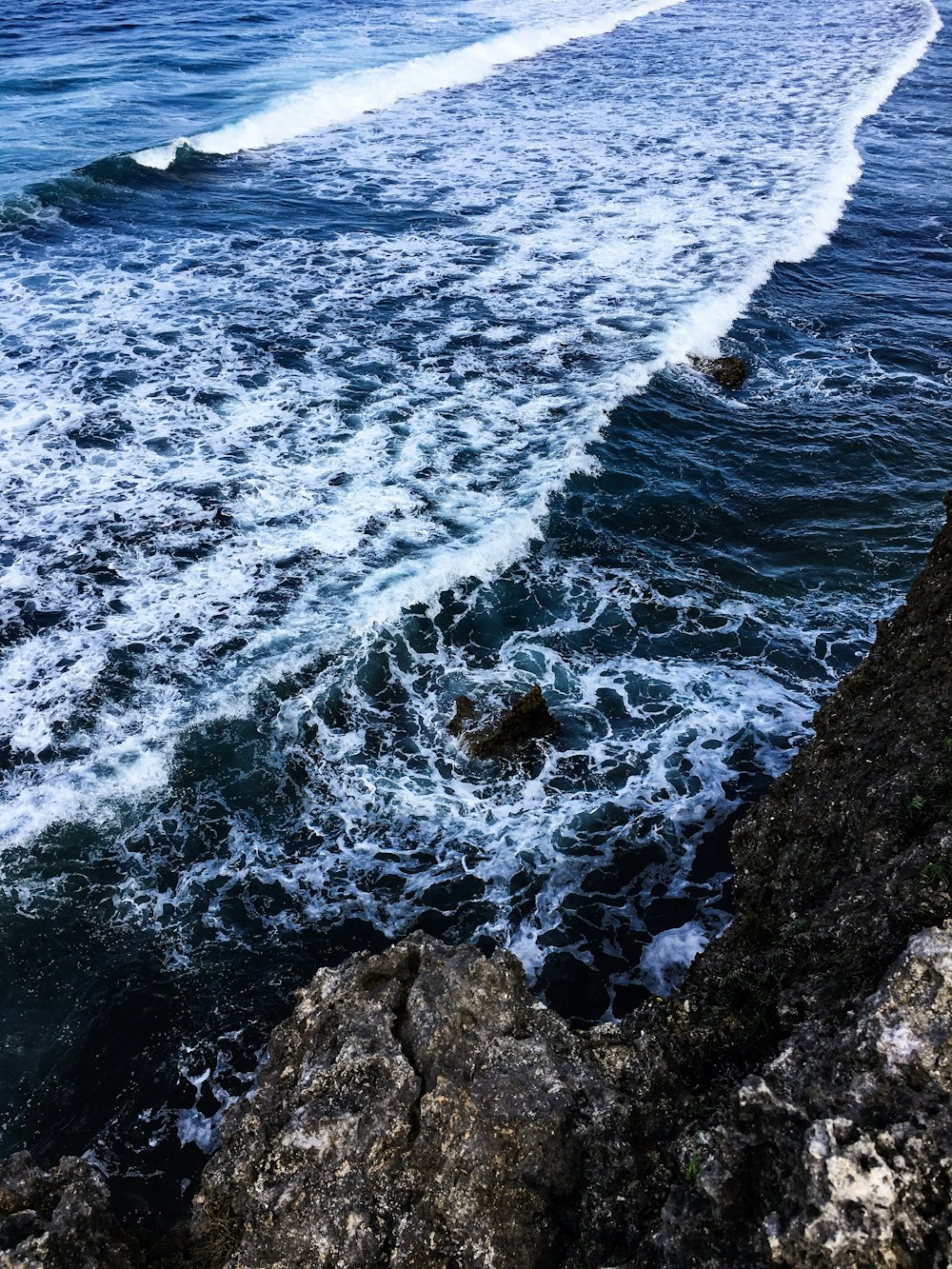 ocean waves through rocks