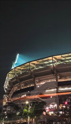 Stadium illuminated at night with the club’s emblem visible.