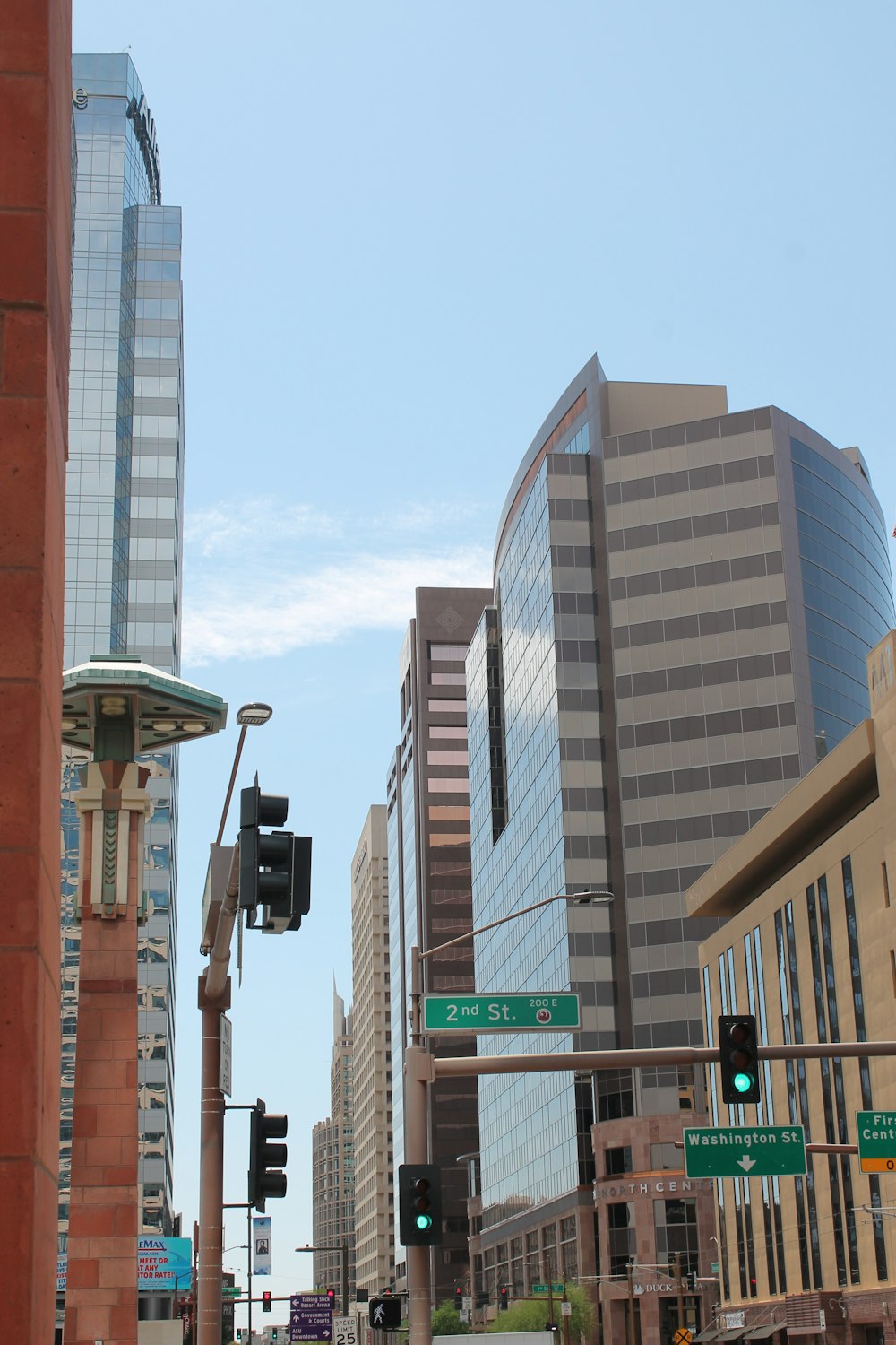 a city street filled with lots of tall buildings