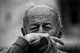 old man grayscale photo
