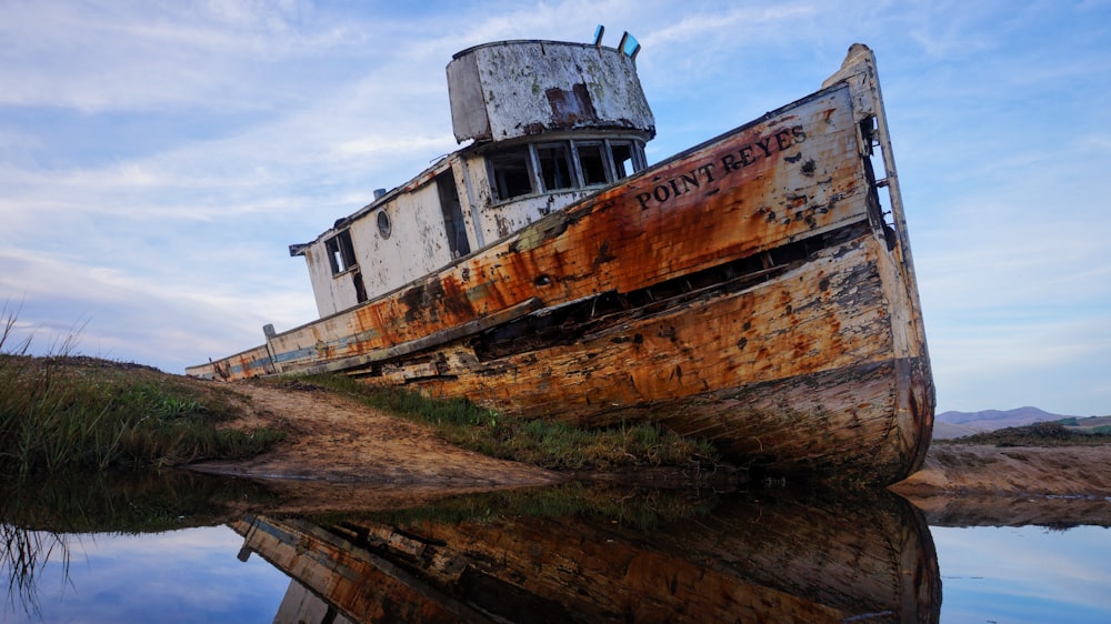 white and brown ship