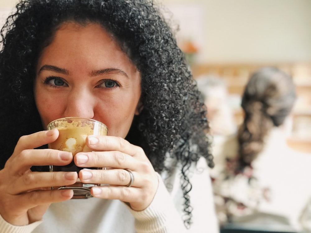 woman drinking coffee