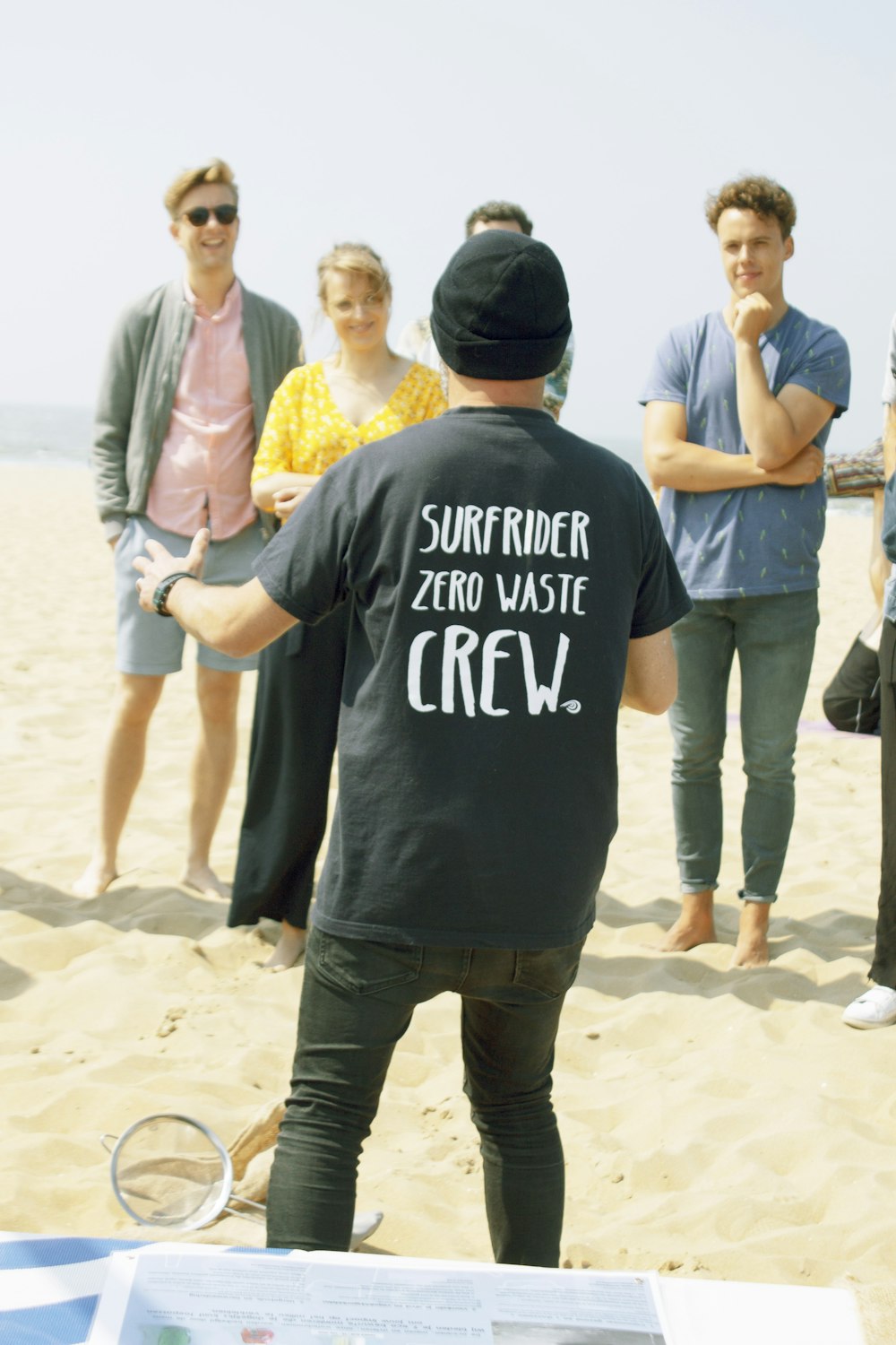 people standing in beach during daytime