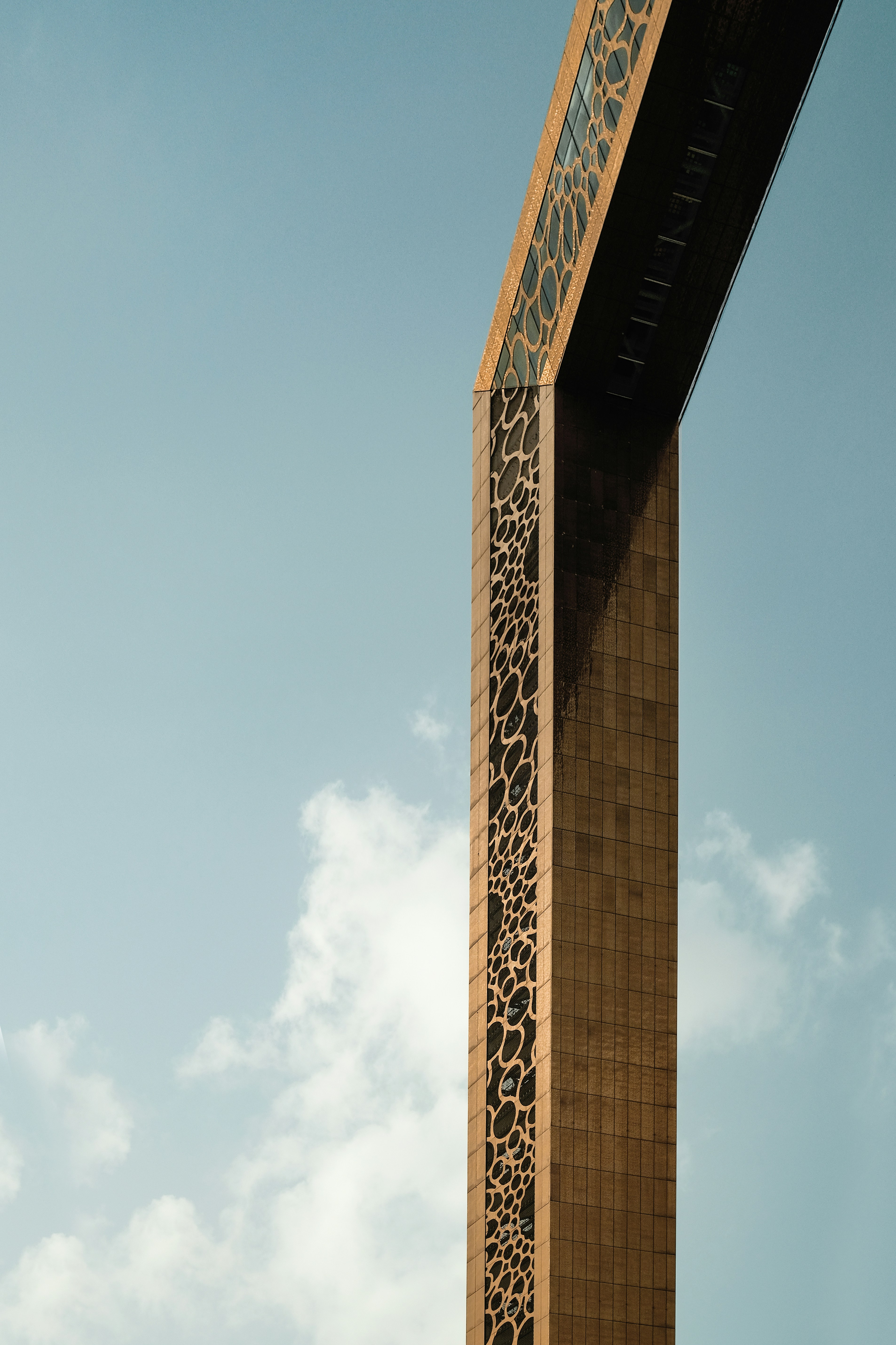 Traditional abra on Dubai Creek with cityscape