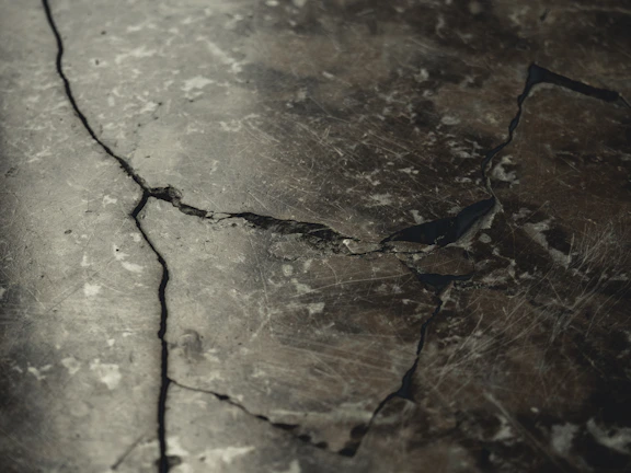 Microscopic view of cracks healing in concrete after heat exposure